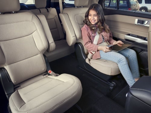 2024 Ford Explorer view of middle and back seats with child in middle captain seat