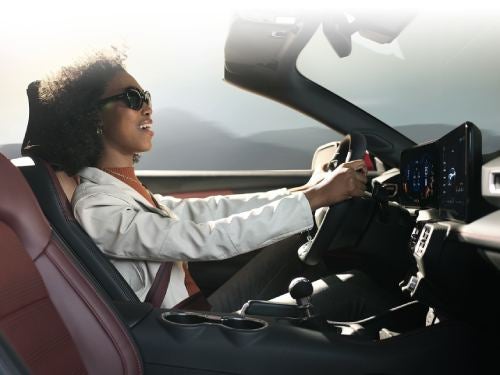 2024 Ford Mustang interior view of woman driving